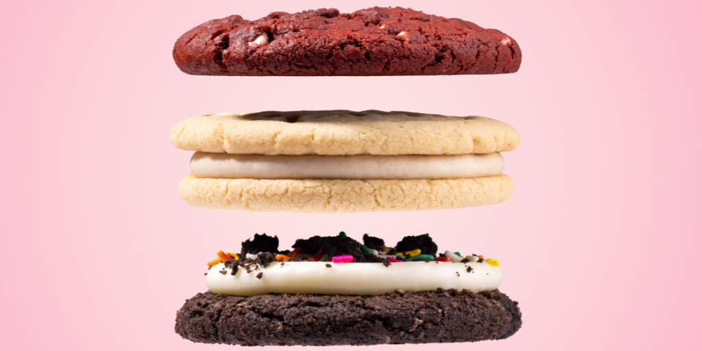 Crumbl cookies on the company's signature pink background